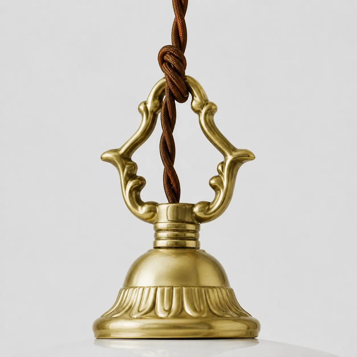 Antique brass ceiling hardware and adjustable cord detail